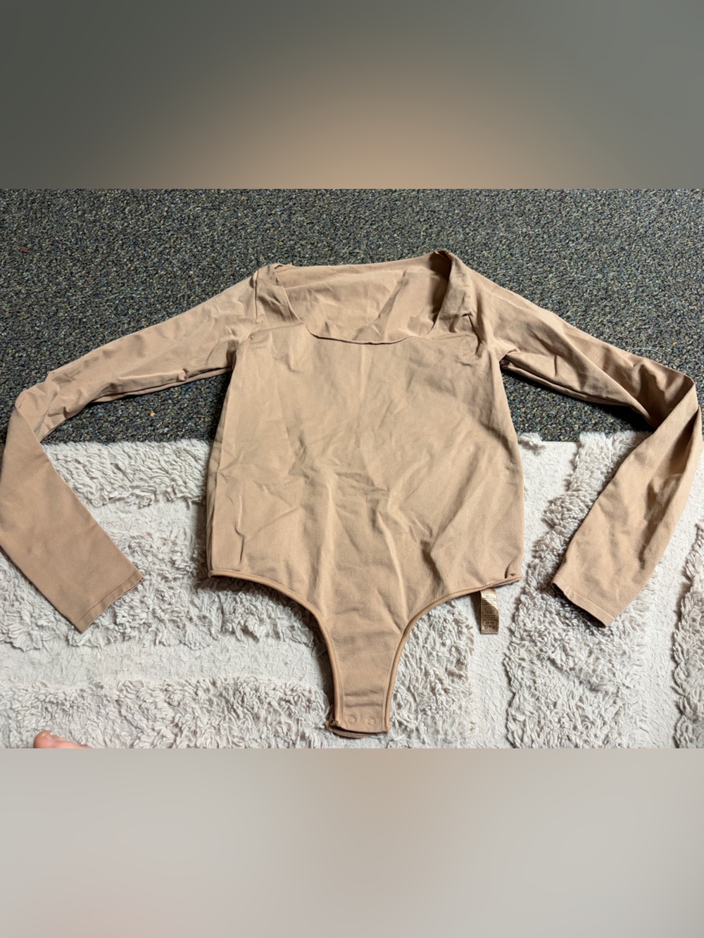 SKIMS Long Sleeve Scoop Neck Bodysuit in Taupe
